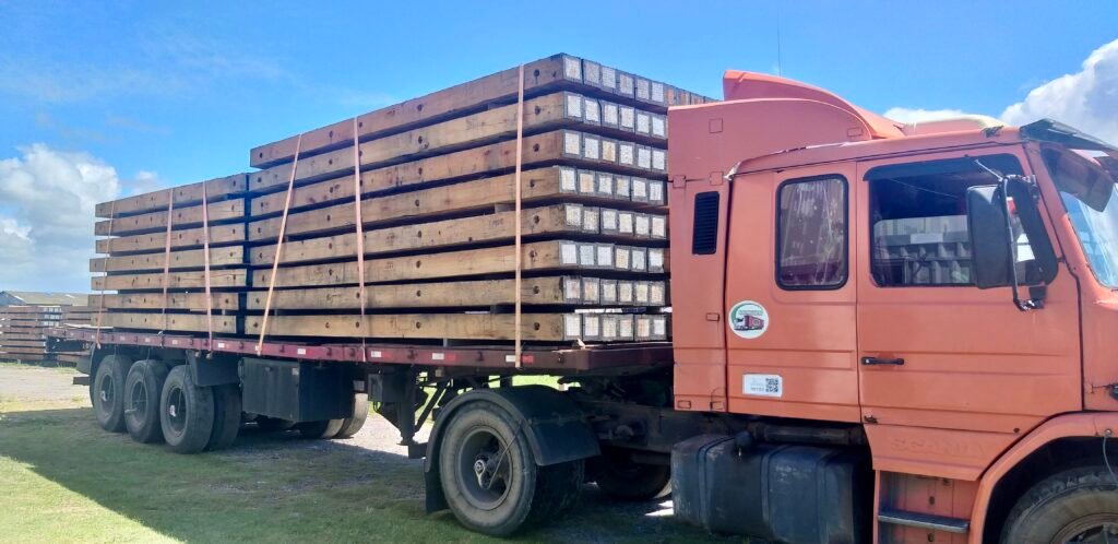 Eucalyptus timber mats loaded on flatbed truck showing higher mat count per load than typical mixed hardwood. That's why Eucalyptus is Cheaper on Freight Alone